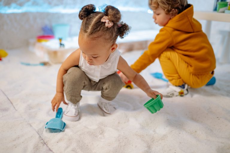 children playing with sand-importance of sensory play