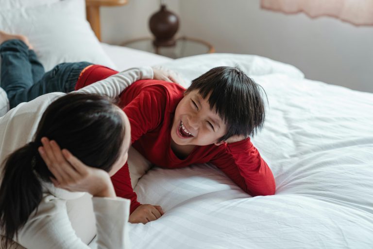 entertain child while lying down
