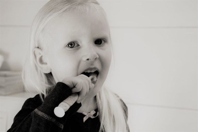how to get toddler to brush teeth without struggle